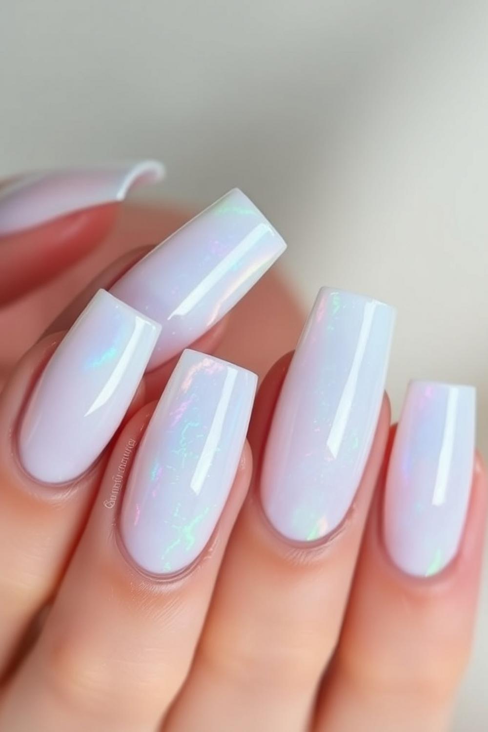 Iridescent opal shimmer nail design with multidimensional shine.